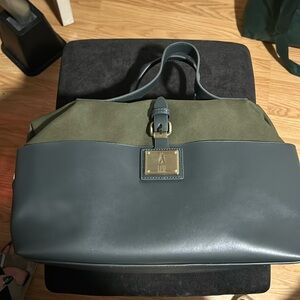 Brand new never used fly bag fly London in colonial navy blue and olive green